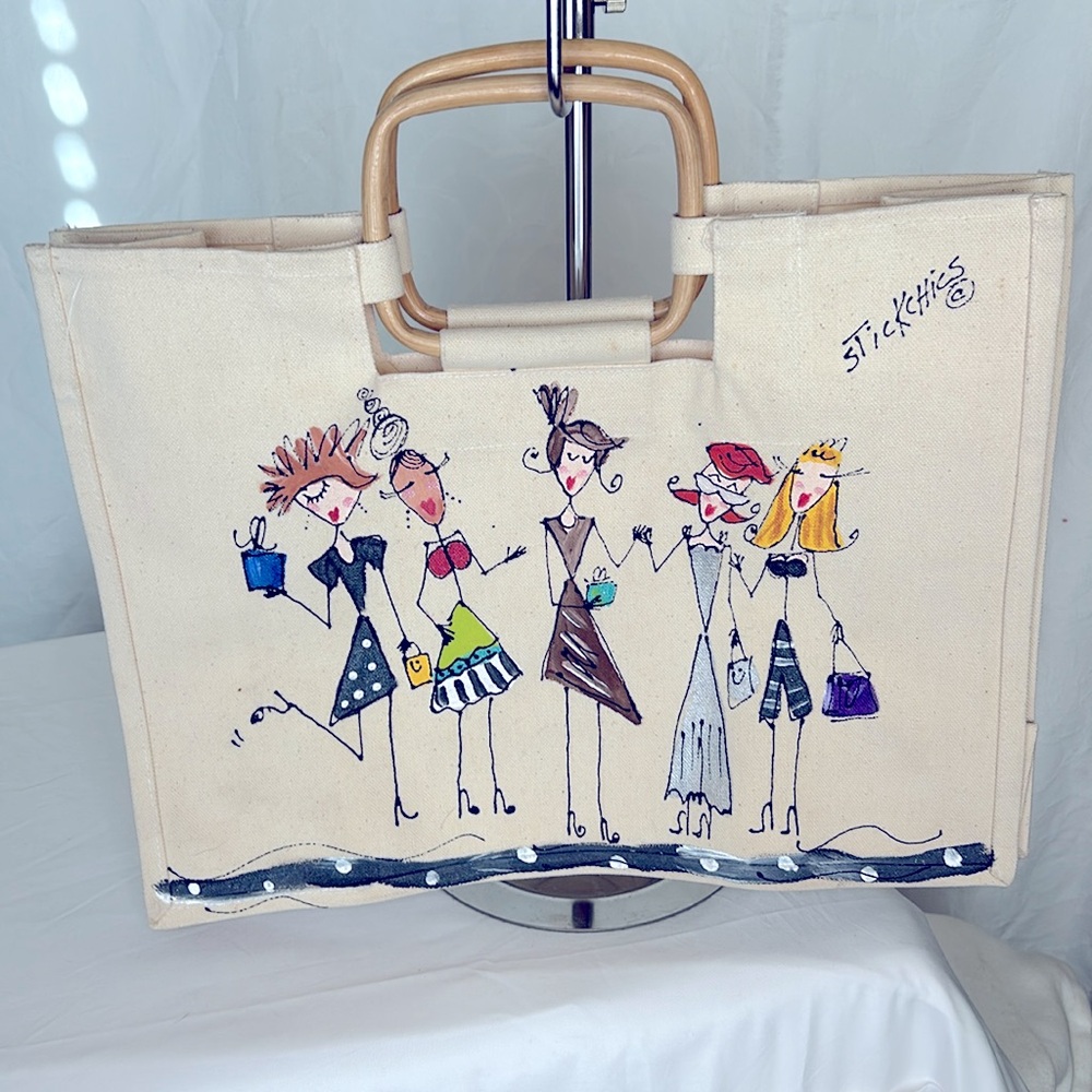 NWOT STICKCHICS graphic print canvas tote with wooden handles.
